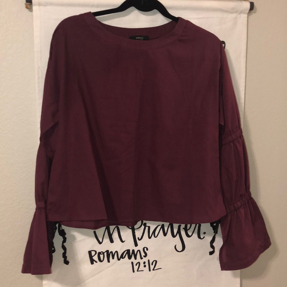 Purple/plum long sleeve boutique like shirt.